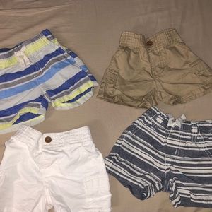 4 paid of boys Gymboree shorts 0-3months